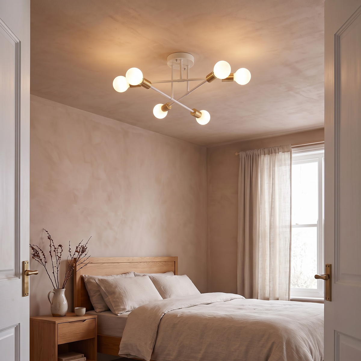 White and gold six-light ceiling fixture above a low oak bed