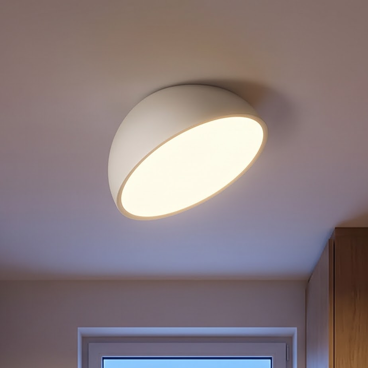 White tilted dome flush ceiling light in a bright oak entry corridor