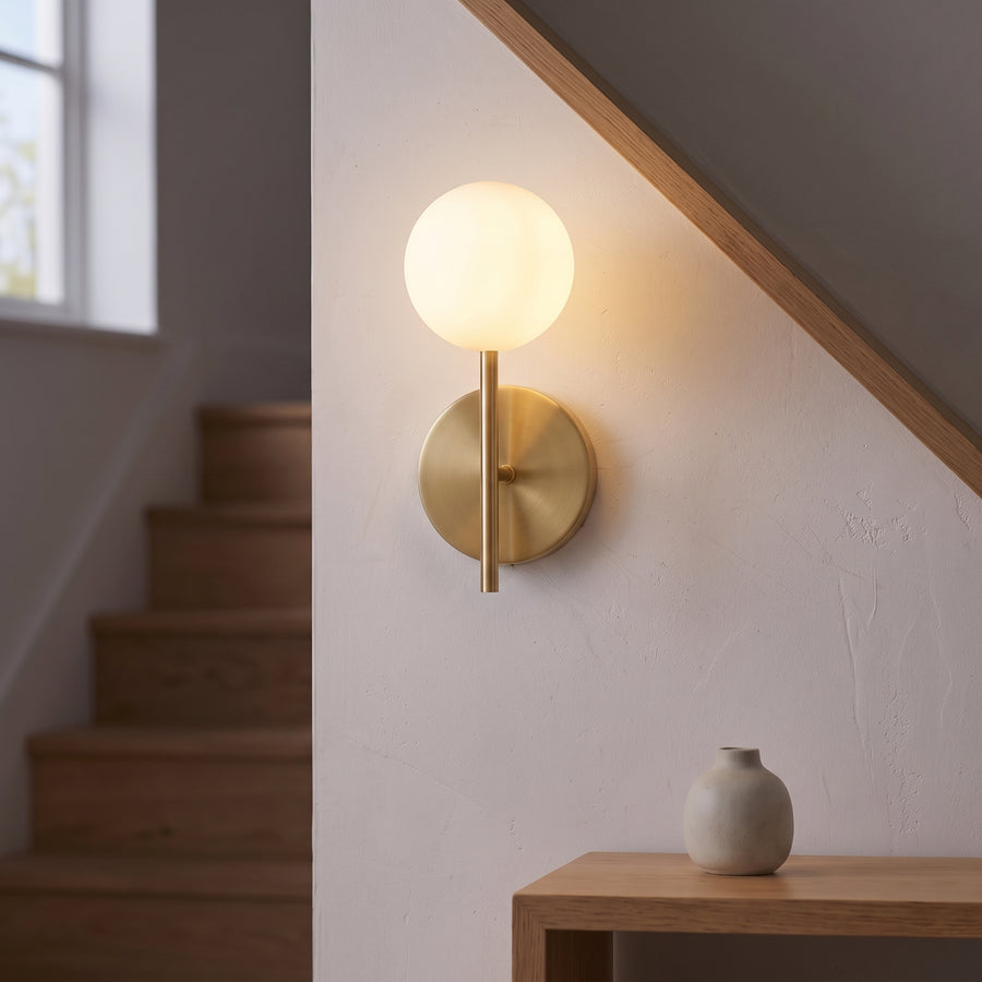 Hoshi Globe Wall Sconce – Opal Glass Globe on a Gold Rod and Round Plate, Gold
