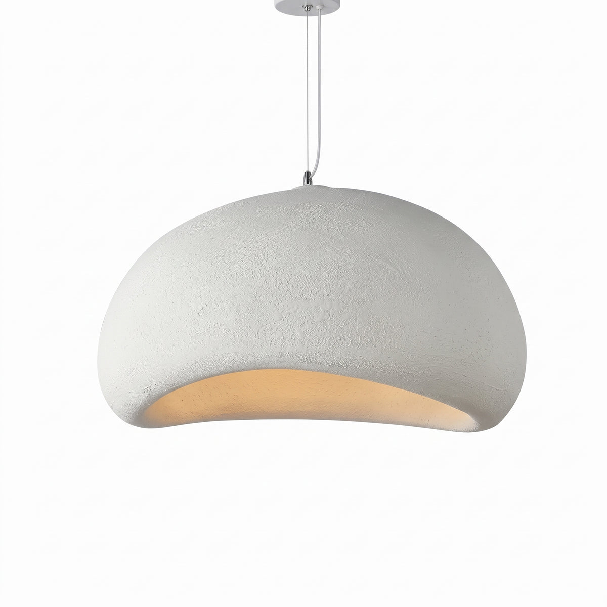 White smooth dome wabi-sabi pendant light with warm glowing opening