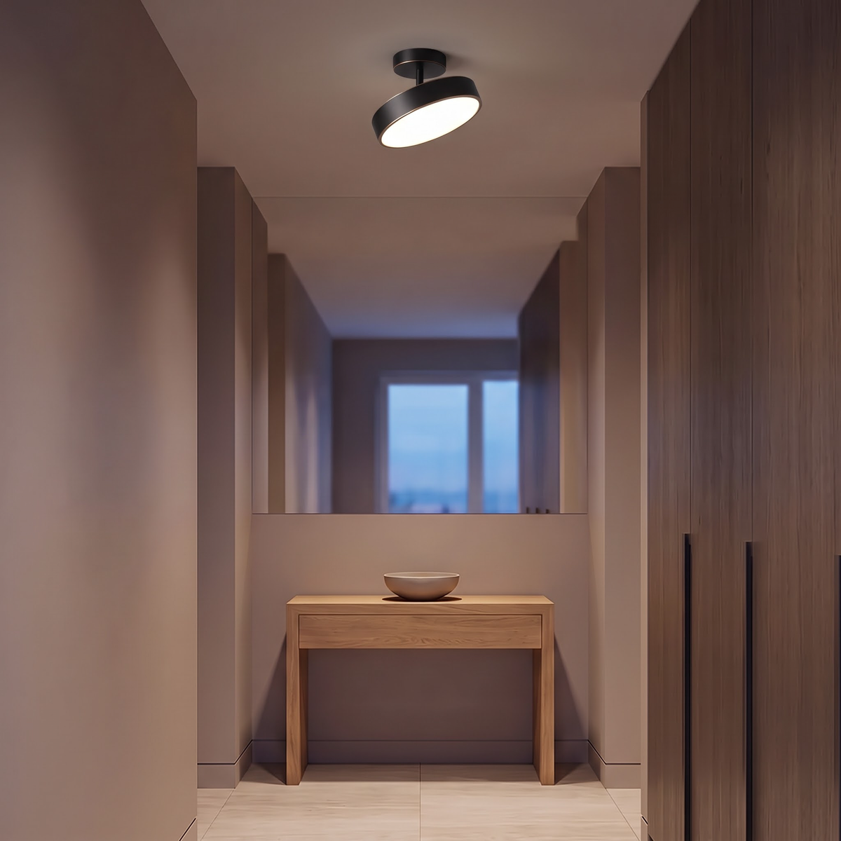 Black semi-flush ceiling light above an oak console in a corridor