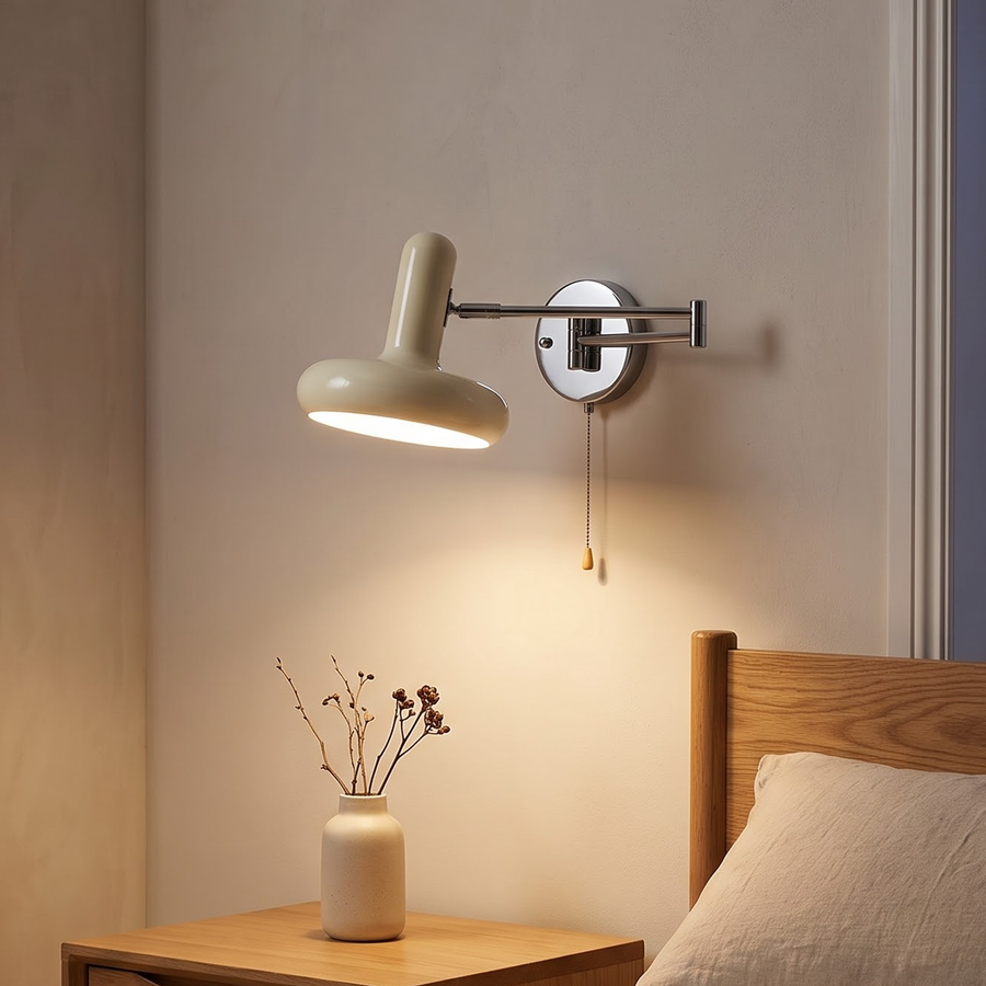 Cream mushroom swing-arm wall lamp with chrome arm above a desk