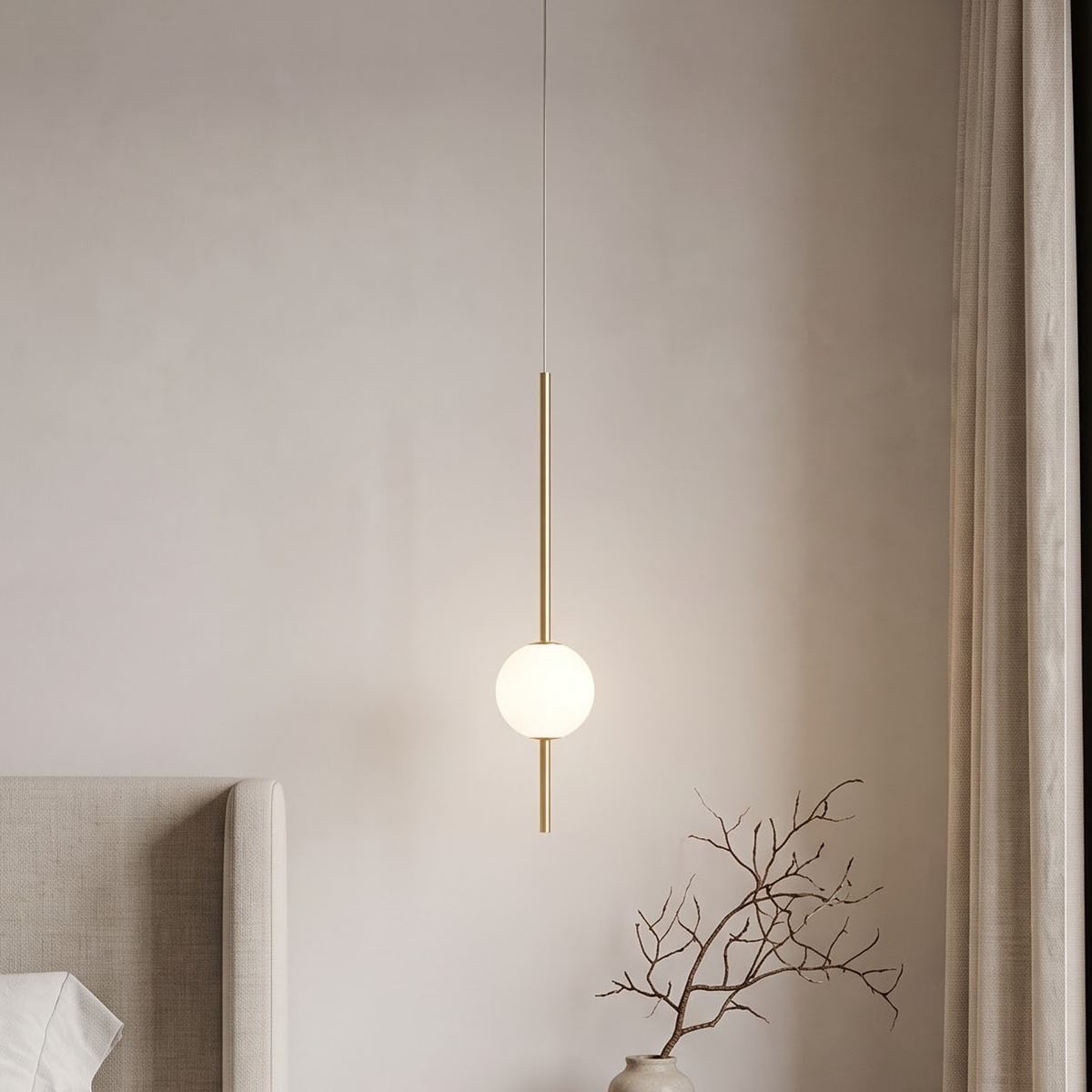 Slim gold rod pendant with opal globe beside an oak nightstand