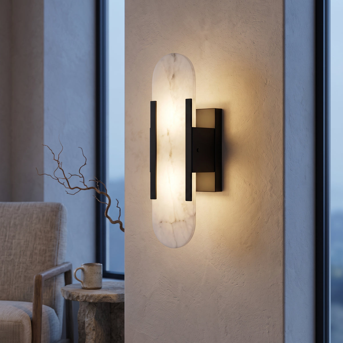 Black and white marble panel sconce glowing in a plaster living room